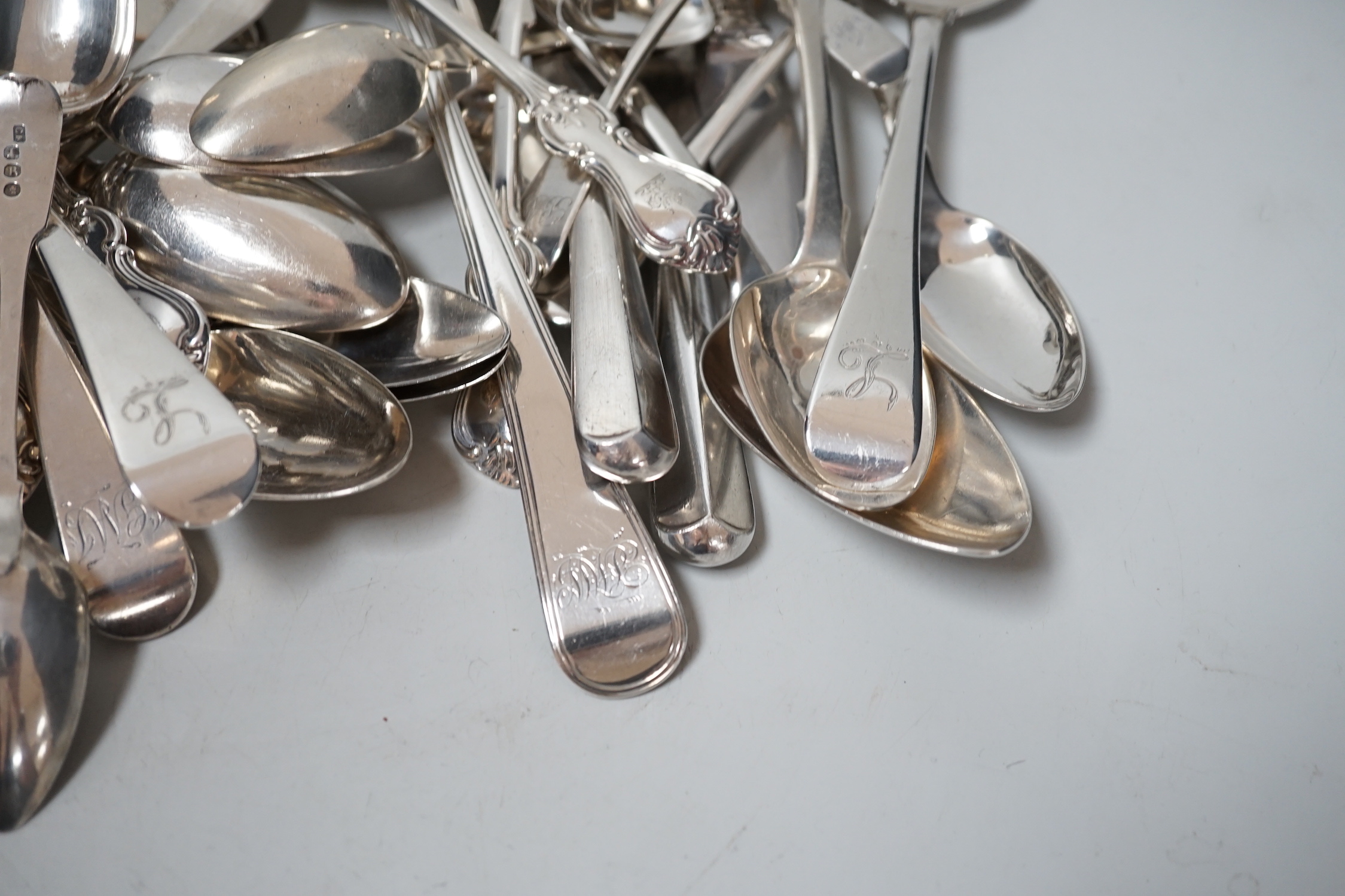 A canteen of mixed George III and later silver flatware, various patterns, dates and makers, 48.6oz.